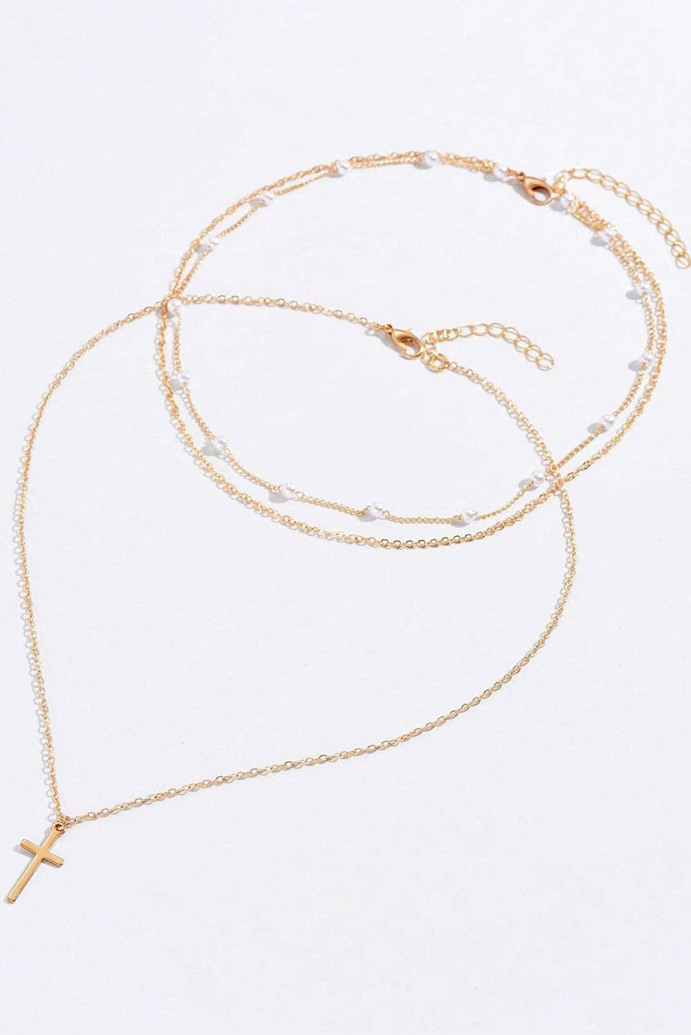 Layered Gold and Pearl Cross Necklace