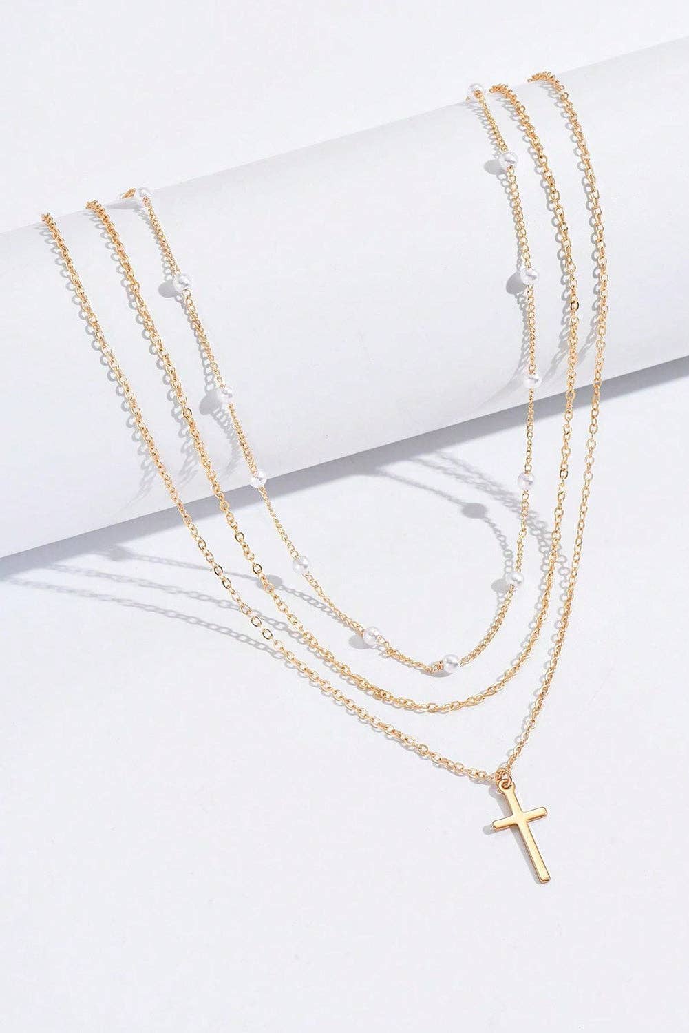 Layered Gold and Pearl Cross Necklace