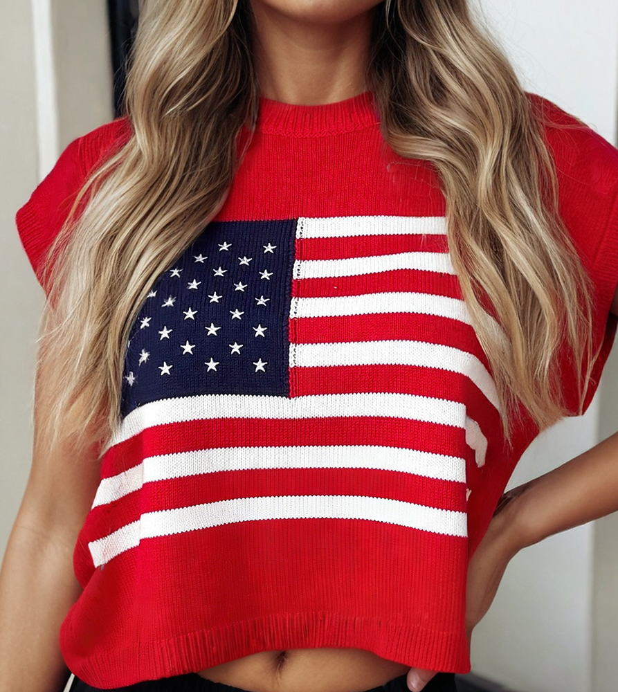Person wearing a sleeveless top with an American flag design.